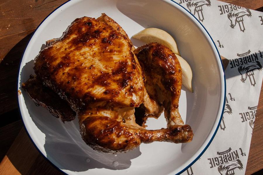 Onbeperkt halve kip & chicken wings + bijgerechten bij 't Kippegie (2 uur)